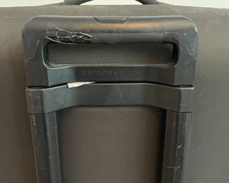 L36 - $75. The Briggs & Riley TU127X-8 Upright. Grey expandable suitcase. Measures 22" x 8.5" x 27.5" tall. Does NOT have spinning wheels. Has been used but still very good condition!
