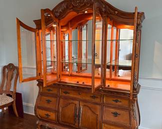 L3 - $250. Lighted China Cabinet. (Moves in 2 pieces). All drawers / door work as they should. Adjustable glass shelves. Measures 66" wide x 18" deep x 90" tall.