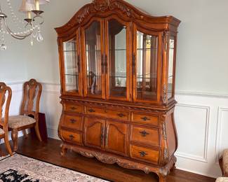 L3 - $250. Lighted China Cabinet. (Moves in 2 pieces). All drawers / door work as they should. Adjustable glass shelves. Measures 66" wide x 18" deep x 90" tall.