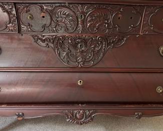 L8 - $475. Believed to be RJ Horner. Figural Carved Framed Mirror. Has dovetailed, Birdseye Maple lined drawers. Needs new handles, but all drawers are solid, quite heavy and slide perfectly! Antique Dresser from NYC. Measures 55.5" x 26" deep x 33" tall. Mirror is 45" x 41". 74" tall assembled. Has 2 small holes on the top that look original but I'm not sure what is supposed to go in them.