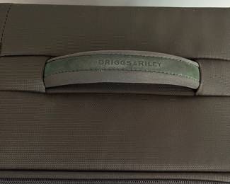 L36 - $75. The Briggs & Riley TU127X-8 Upright. Grey expandable suitcase. Measures 22" x 8.5" x 27.5" tall. Does NOT have spinning wheels. Has been used but still very good condition!