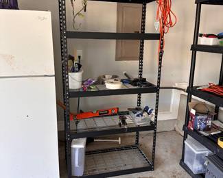L98 - $40. Metal Garage Shelf. Measures 36" x 18" x 71" tall. Disassembles to move if needed. M