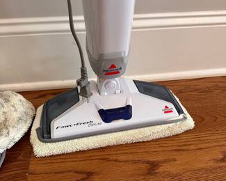 L85 - $40. Bissell Power Fresh Floor Cleaner with several washable replacement pads.