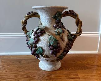 L26 - $20. Grape Pot - As is. Has damage on several grape leaves. Measures 14" wide x 15" tall.