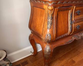 L4 - $250. Buffet / Side Board. Measures 59" x 18" deep x 39.5" tall. Has stone or marble top. All doors/drawers work as they should. Very good, gently used condition.
