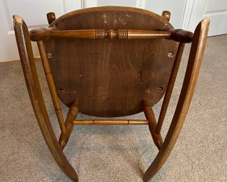 L42 - $35. Wooden Rocking Chair. Has been chewed by a puppy a long time ago. Still very sturdy, just a little nibble. As Is.