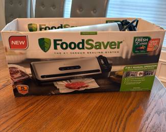 L61 - $30. Food Saver with extra bags.