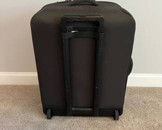 L36 - $75. The Briggs & Riley TU127X-8 Upright. Grey expandable suitcase. Measures 22" x 8.5" x 27.5" tall. Does NOT have spinning wheels. Has been used but still very good condition!
