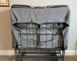 L43 - $50. Zinus Fold up twin bed. Measures 37" x 72" x 19" when opened. Stores neatly in a closet.