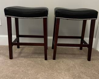 L65 - $40. PAIR of counter height bar stools. Measures 19" x 13" x 25" tall.