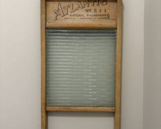 L49 - $30. Atlantic No 511 Washboard. Wooden framed with ribbed glass board.