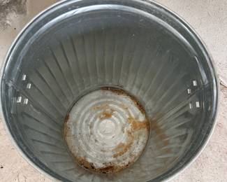 L91 - $15. Steel trash can with lid - looks like it stored dog or bird food.