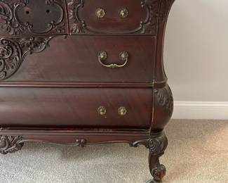 L8 - $475. Believed to be RJ Horner. Figural Carved Framed Mirror. Has dovetailed, Birdseye Maple lined drawers. Needs new handles, but all drawers are solid, quite heavy and slide perfectly! Antique Dresser from NYC. Measures 55.5" x 26" deep x 33" tall. Mirror is 45" x 41". 74" tall assembled. Has 2 small holes on the top that look original but I'm not sure what is supposed to go in them.