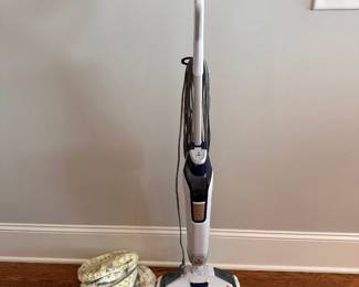 L85 - $40. Bissell Power Fresh Floor Cleaner with several washable replacement pads.