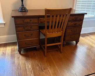 L73 - $30. Office Desk with Chair. All drawers slide as they should. A bit of wear along the base but overall very good condition.