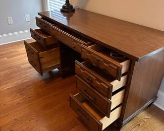 L73 - $30. Office Desk with Chair. All drawers slide as they should. A bit of wear along the base but overall very good condition.