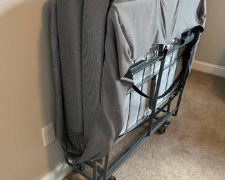 L43 - $50. Zinus Fold up twin bed. Measures 37" x 72" x 19" when opened. Stores neatly in a closet.