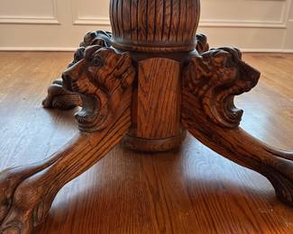 L10 - $350. Round or Oval Solid Wood Dining Table. Has carved lions on the base. Measures 48" round x 29.5" tall. 2 leaves are 11.5" each. I believe this is Hastings Table Co. or RJ Horner. Both made similar tables in the late 1800s. Table top isn't terrible but has a few marks here and there. Sturdy & very useable as is!