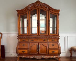 L3 - $250. Lighted China Cabinet. (Moves in 2 pieces). All drawers / door work as they should. Adjustable glass shelves. Measures 66" wide x 18" deep x 90" tall.