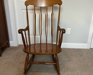L42 - $35. Wooden Rocking Chair. Has been chewed by a puppy a long time ago. Still very sturdy, just a little nibble. As Is.