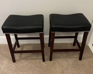 L65 - $40. PAIR of counter height bar stools. Measures 19" x 13" x 25" tall.