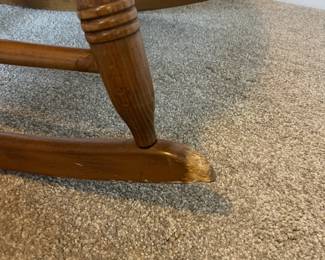 L42 - $35. Wooden Rocking Chair. Has been chewed by a puppy a long time ago. Still very sturdy, just a little nibble. As Is.