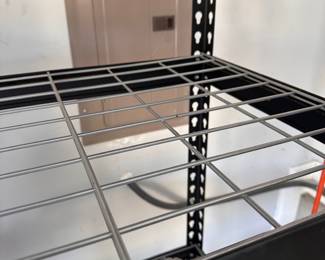 L98 - $40. Metal Garage Shelf. Measures 36" x 18" x 71" tall. Disassembles to move if needed. M