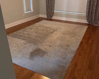L15 - $95. Dalyn Rug Company. "Laramie" 9' x 13'. AS IS. Rug is sun faded as seen in the photos. The darker color is where the bed was - it does not vacuum to be the same color.