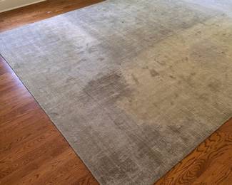 L15 - $95. Dalyn Rug Company. "Laramie" 9' x 13'. AS IS. Rug is sun faded as seen in the photos. The darker color is where the bed was - it does not vacuum to be the same color.