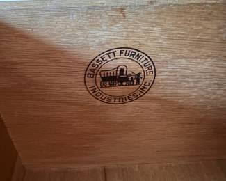 L18 - $95. Bassett Furniture 4 Drawer Chest of Drawers. Measures 32" wide x 17.75" deep x 44" tall. All drawers slide - overall good condition. Has a few pieces of veneer missing at the bottom right and minor surface scratches / marks.