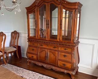 L3 - $250. Lighted China Cabinet. (Moves in 2 pieces). All drawers / door work as they should. Adjustable glass shelves. Measures 66" wide x 18" deep x 90" tall.