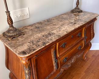 L4 - $250. Buffet / Side Board. Measures 59" x 18" deep x 39.5" tall. Has stone or marble top. All doors/drawers work as they should. Very good, gently used condition.