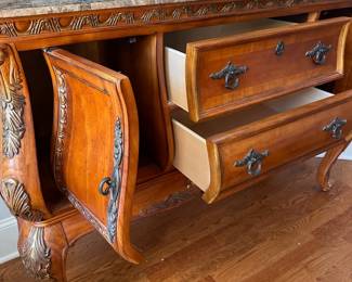 L4 - $250. Buffet / Side Board. Measures 59" x 18" deep x 39.5" tall. Has stone or marble top. All doors/drawers work as they should. Very good, gently used condition.