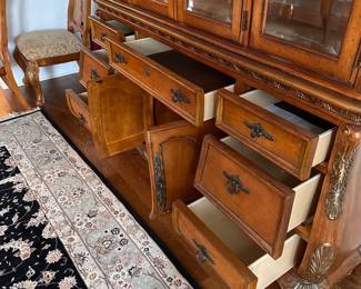 L3 - $250. Lighted China Cabinet. (Moves in 2 pieces). All drawers / door work as they should. Adjustable glass shelves. Measures 66" wide x 18" deep x 90" tall.