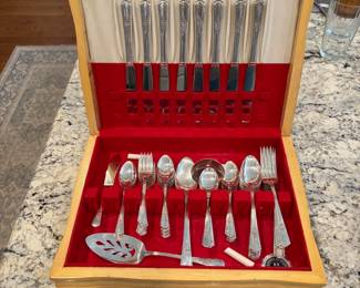 L29 - $65. Rogers Overlaid Flatware Plated set. Service for 8 + extras.