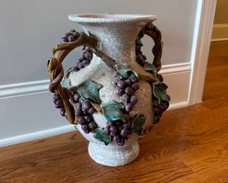 L26 - $20. Grape Pot - As is. Has damage on several grape leaves. Measures 14" wide x 15" tall.