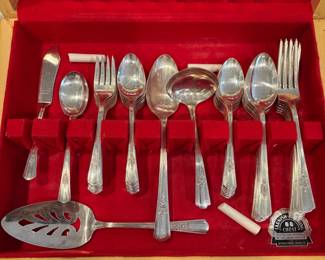 L29 - $65. Rogers Overlaid Flatware Plated set. Service for 8 + extras.