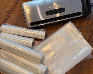 L61 - $30. Food Saver with extra bags.