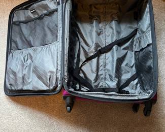 L63 - $60. TravelPro 28" Expandable. 4 Spinner wheels. Very good condition.