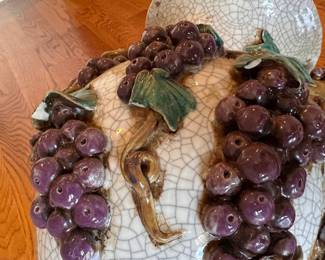 L26 - $20. Grape Pot - As is. Has damage on several grape leaves. Measures 14" wide x 15" tall.