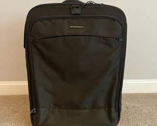 L36 - $75. The Briggs & Riley TU127X-8 Upright. Grey expandable suitcase. Measures 22" x 8.5" x 27.5" tall. Does NOT have spinning wheels. Has been used but still very good condition!