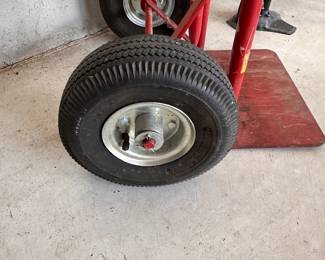L94 - $40. Metal Dolly. Tires use air - not solid hard plastic. Good condition. No name / weight listed.