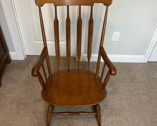 L42 - $35. Wooden Rocking Chair. Has been chewed by a puppy a long time ago. Still very sturdy, just a little nibble. As Is.