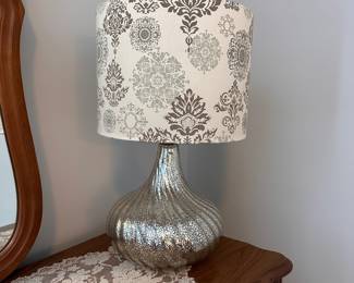 L17 - $25. Table Lamp. Measures 22.5" tall. Base is glass and shade is in great condition.