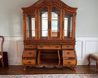 L3 - $250. Lighted China Cabinet. (Moves in 2 pieces). All drawers / door work as they should. Adjustable glass shelves. Measures 66" wide x 18" deep x 90" tall.