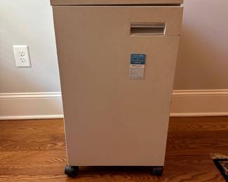 L72 - $20. Rolling Metal Cabinet. Measures 16" x 19" deep x 28.5" tall.