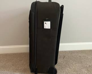 L36 - $75. The Briggs & Riley TU127X-8 Upright. Grey expandable suitcase. Measures 22" x 8.5" x 27.5" tall. Does NOT have spinning wheels. Has been used but still very good condition!