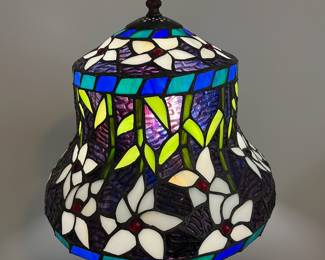 L9 - $50. Warehouse of Tiffany Table Lamp. Measures 21" tall. Excellent Condition.