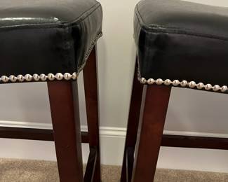 L65 - $40. PAIR of counter height bar stools. Measures 19" x 13" x 25" tall.