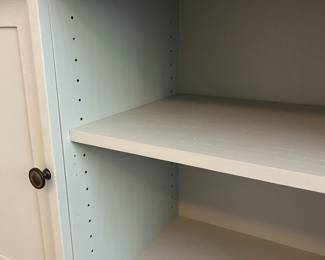 L34 - $60. Painted Media Stand. Measures 56.75" across the front x 18" x 28" tall. Very sturdy. Overall very good condition - does have a few minor paint scuff on the top. Was used in a corner for a TV stand.